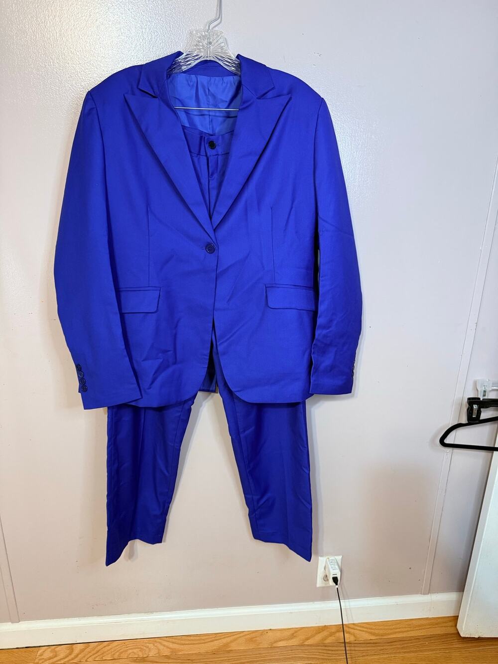 Women’s unbranded royal blue pantsuit. New no tags. Size L
